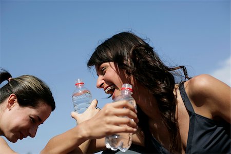 Two women drinking to close friendship with each other Stock Photo - Premium Royalty-Free, Code: 628-02954422