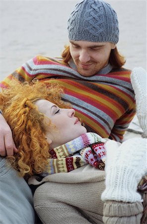 scarf curly woman - Young Woman with red Curls lying in the Lap of her Boyfriend - Relationship - Togetherness - Season Stock Photo - Premium Royalty-Free, Code: 628-02954656