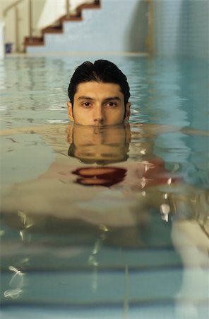 stair sports - Darkhaired Man in a Swimming-Pool - Sports - Leisure Time Stock Photo - Premium Royalty-Free, Code: 628-02954733