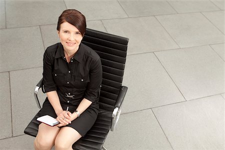 Businesswoman with personal organizer, Munich, Bavaria, Germany Foto de stock - Sin royalties Premium, Código: 628-02953626
