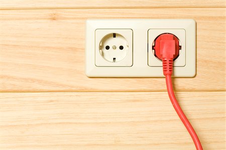 simsearch:700-00549356,k - Power plug in plug socket, Germany Stock Photo - Premium Royalty-Free, Code: 628-02953700