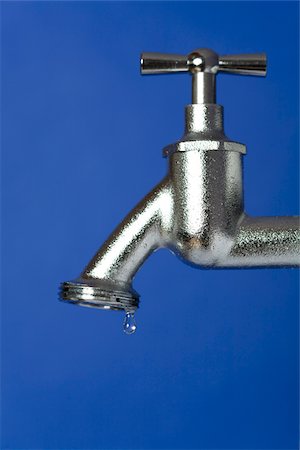 Drop of water falling from faucet, Germany Stock Photo - Premium Royalty-Free, Code: 628-02953718