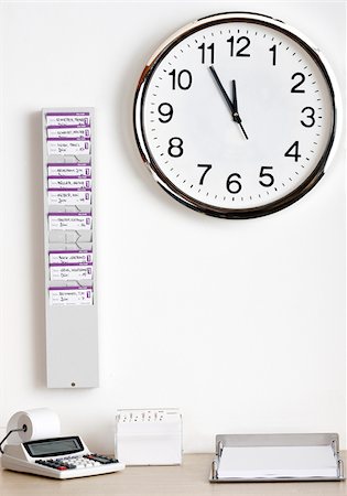 Wall clock and time cards Foto de stock - Sin royalties Premium, Código: 628-02953957