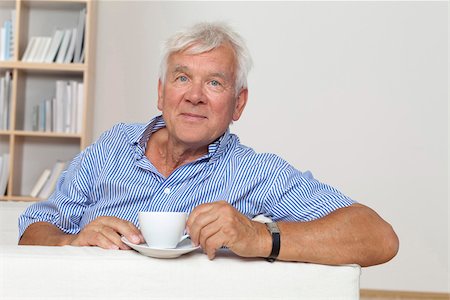 repose - Relaxed senior man with cup of coffee on couch Stock Photo - Premium Royalty-Free, Code: 628-03201193