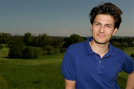 fashion casual clothing man young portrait not woman - Young man on golf course Stock Photo - Premium Royalty-Free, Code: 628-03201237