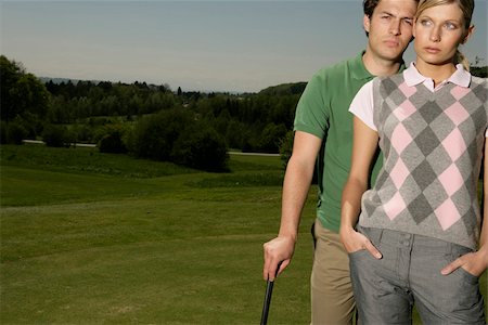 sports fashion - Young couple on golf course Foto de stock - Sin royalties Premium, Código: 628-03201258