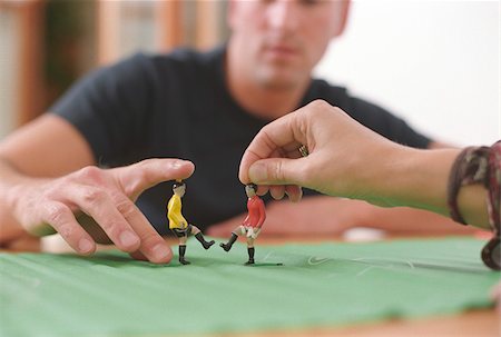 simsearch:628-03201305,k - People playing with a Table Soccer Game (Detail) Foto de stock - Sin royalties Premium, Código: 628-03201267