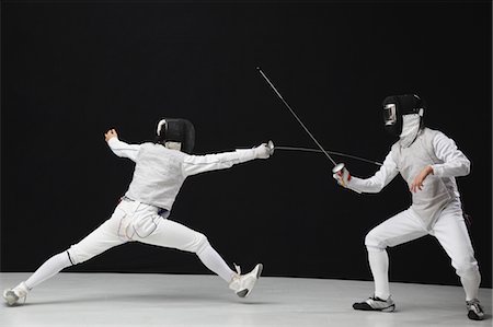 pelea (física) - Fencing Foto de stock - Sin royalties Premium, Código: 622-05390836