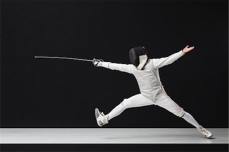 excercise black background - Fencing Stock Photo - Premium Royalty-Free, Code: 622-05390842