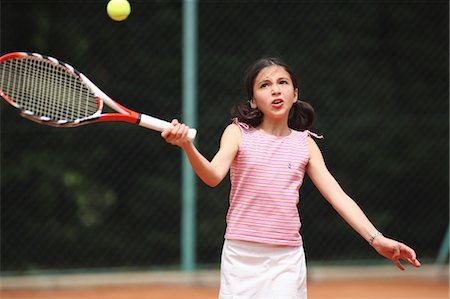 preteen tennis - Girl Hitting Forehand Shot Stock Photo - Premium Royalty-Free, Code: 622-05390888