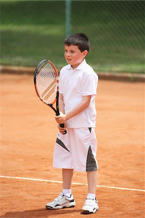 Young Boy Preparing For Shot Foto de stock - Sin royalties Premium, Código: 622-05390916