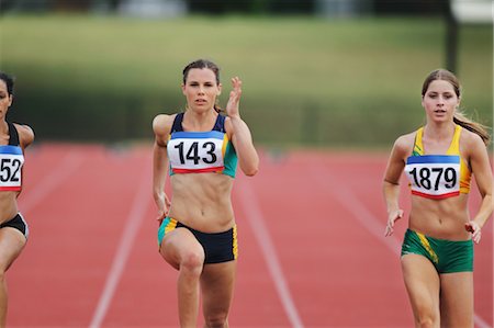 Female Runners On Racetrack Stock Photo - Premium Royalty-Free, Code: 622-05602863