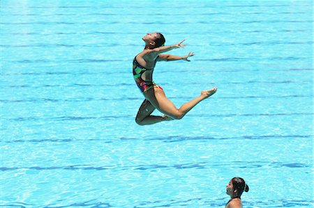 swimmers in pool from above - Swimmers Performing, Synchronized Swimming Stock Photo - Premium Royalty-Free, Code: 622-05786713