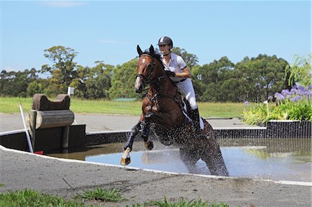 simsearch:841-03505070,k - Horse Rider Crossing Water in Equestrian Event Foto de stock - Sin royalties Premium, Código: 622-05786755