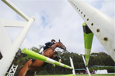 simsearch:622-05786785,k - Horseback Rider Jumping Hurdle Foto de stock - Sin royalties Premium, Código: 622-05786786