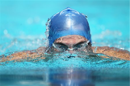 Young Man Swimming, Close-Up Foto de stock - Sin royalties Premium, Código: 622-05786800