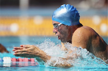 swimmers - Young Man Swimming Breaststroke Stock Photo - Premium Royalty-Free, Code: 622-05786835