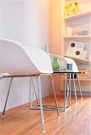 empty room with wooden floor - White Easy Chairs In Living Room Stock Photo - Premium Royalty-Free, Code: 622-06009657