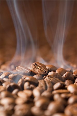 smoking food - Hot Coffee Bean With Smoke Stock Photo - Premium Royalty-Free, Code: 622-06009971