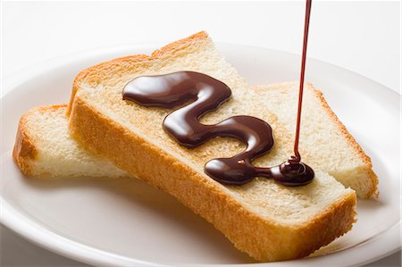 derretimiento - Chocolate On Bread Slice Foto de stock - Sin royalties Premium, Código: 622-06010040