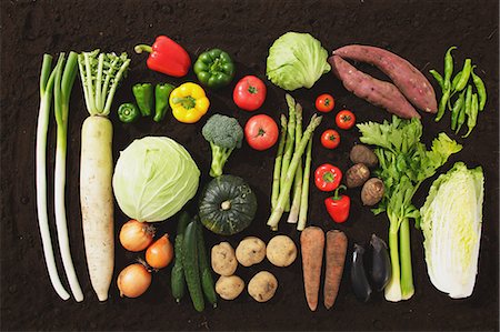 Collection Of Various Vegetables Against Brown Background Foto de stock - Sin royalties Premium, Código: 622-06163854