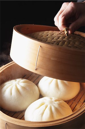 Dumpling In Wooden Container Foto de stock - Sin royalties Premium, Código: 622-06163876