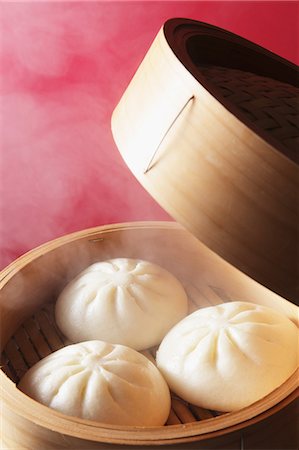 Hot Dumpling With Red Background Foto de stock - Sin royalties Premium, Código: 622-06163878