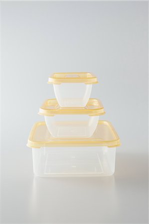 small store - Three Pieces Of Tupperware Stacked On Top Of Each Other Stock Photo - Premium Royalty-Free, Code: 622-06163939