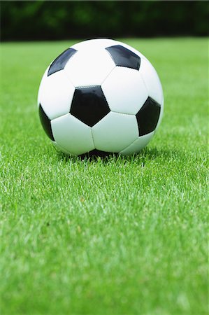 soccer ball closeup - Soccer Ball On Grassland Stock Photo - Premium Royalty-Free, Code: 622-06163963