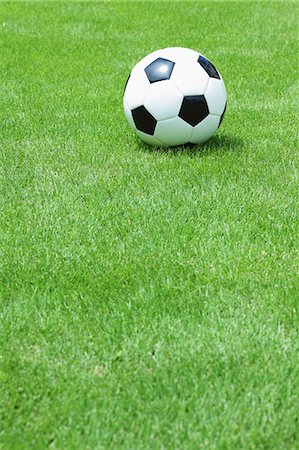 soccer ball closeup - Soccer Ball On Grass Stock Photo - Premium Royalty-Free, Code: 622-06163977