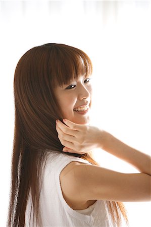 Japanese Woman Smiling Stock Photo - Premium Royalty-Free, Code: 622-06190755