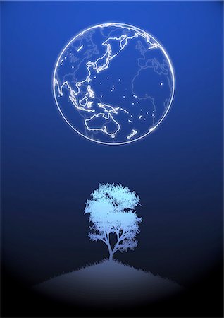 earth silhouette - Globe Over Shiny Tree Stock Photo - Premium Royalty-Free, Code: 622-06191035