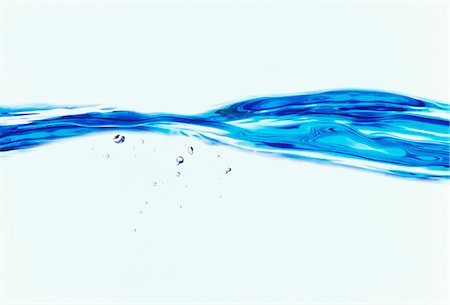 simsearch:622-06190665,k - Blue Splashing Water On White, Close-Up Stock Photo - Premium Royalty-Free, Code: 622-06191155