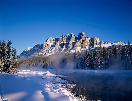 Castle Mountain and Bow river in winter Stock Photo - Premium Royalty-Free, Code: 622-06370216