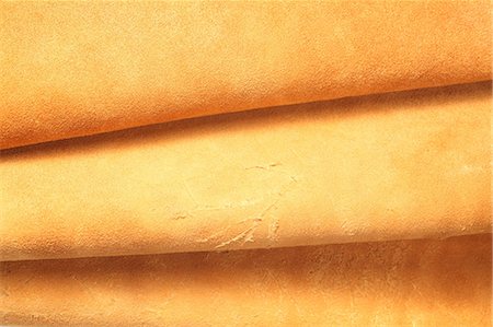 Buckskin leather texture Foto de stock - Sin royalties Premium, Código: 622-06397817