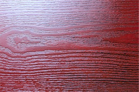 Red lacquered wood texture Stock Photo - Premium Royalty-Free, Code: 622-06439317