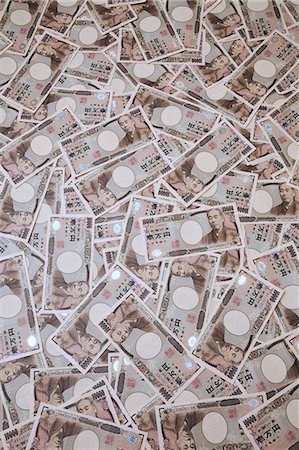 Ten thousand Yen notes Stock Photo - Premium Royalty-Free, Code: 622-06439354