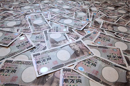 Ten thousand Yen notes Stock Photo - Premium Royalty-Free, Code: 622-06439355