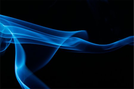 Blue smoke on black background Stock Photo - Premium Royalty-Free, Code: 622-06486715