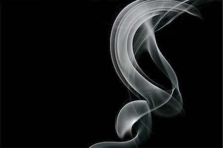 White smoke on black background Stock Photo - Premium Royalty-Free, Code: 622-06486749