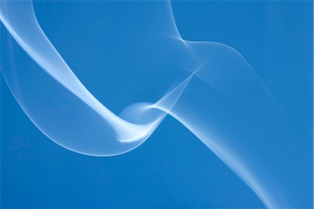 fantastical - White smoke on blue background Stock Photo - Premium Royalty-Free, Code: 622-06486769