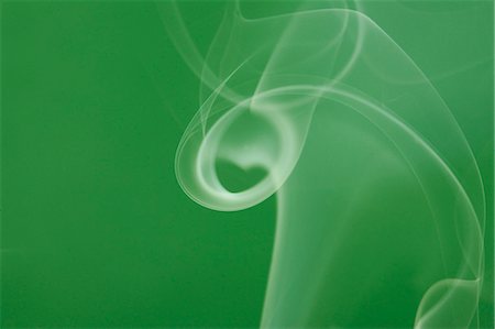 White smoke on green background Stock Photo - Premium Royalty-Free, Code: 622-06486785