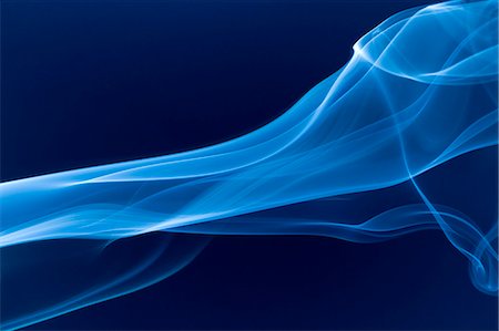 White smoke on blue background Stock Photo - Premium Royalty-Free, Code: 622-06548860