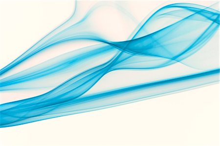 Blue smoke on white background Stock Photo - Premium Royalty-Free, Code: 622-06548882