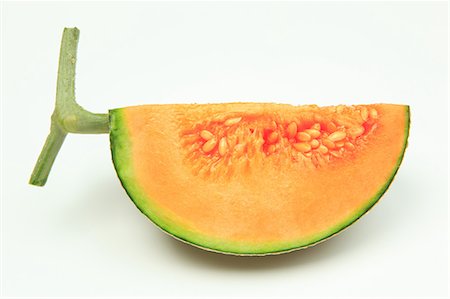 round slice - Melon Stock Photo - Premium Royalty-Free, Code: 622-06549218