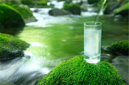 environment not monochrome and nobody - Glass of water near a mountain stream Stock Photo - Premium Royalty-Free, Code: 622-06549331