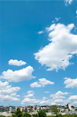 Residential area and blue sky with clouds Stockbilder - Premium RF Lizenzfrei, Bildnummer: 622-06549469