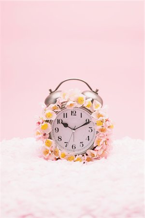 fake flowers - Clock and Cherry blossom Stock Photo - Premium Royalty-Free, Code: 622-06782273