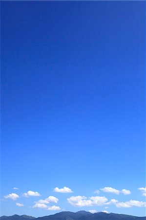 simsearch:622-06809747,k - Mountains and blue sky with clouds Fotografie stock - Premium Royalty-Free, Codice: 622-06809793