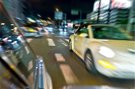 speed car - Car travelling at night Stock Photo - Premium Royalty-Free, Code: 622-06900703